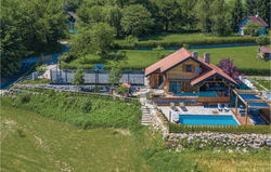 Three-Bedroom Holiday Home in Gornji Zvecaj