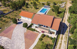 Four-Bedroom Holiday Home in Lisicic