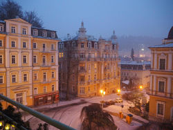 2 balconies above colonnade apartment