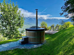 Eco Lodge with Jacuzzi and View in the Swiss Alps