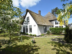 Luxuriously restored farmhouse with trendy interior close to sea and forest