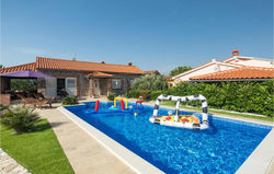 Awesome home in Dobrinj with Outdoor swimming pool, Sauna and 5 Bedrooms
