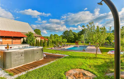 Awesome home in Lovinac with Outdoor swimming pool, Jacuzzi and 2 Bedrooms