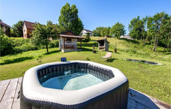 Nice home in Gomirje with Jacuzzi and 2 Bedrooms