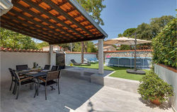 Nice home in Porec with WiFi, Outdoor swimming pool and 2 Bedrooms