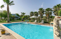 Beautiful home in Rosolini with Outdoor swimming pool, WiFi and 3 Bedrooms