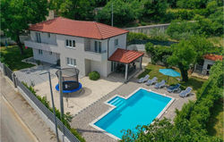 Awesome home in Zmijavci with Outdoor swimming pool, WiFi and 5 Bedrooms