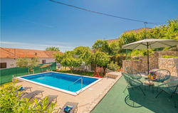 Beautiful home in Runovic with Outdoor swimming pool, WiFi and 3 Bedrooms