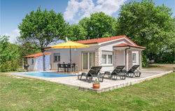 Nice home in Loborika with Outdoor swimming pool, WiFi and 2 Bedrooms