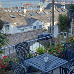 LOBSTER POT APARTMENT with stunning harbour and sea views and free parking for one car & pet friendly