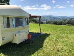 Retro Caravan with Mountain Views