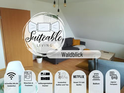 Suiteable Living - Waldblick Apartment mit Balkon