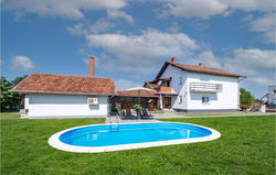 Nice home in Dakovo with heated swimmingpool for your vacation