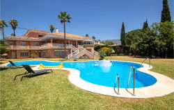 Nice home in Mijas Costa with Outdoor swimming pool, Sauna and 7 Bedrooms