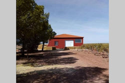 Casita de campo con vistas a una laguna