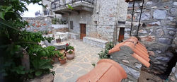 Stone house with a beautiful yard