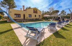 Awesome home in Can Carbonell with WiFi, Outdoor swimming pool and 4 Bedrooms